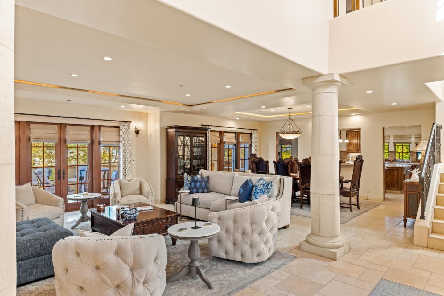 3116 Bird Rock Road Pebble Beach, CA 93953 - Photo 4 of 37 a living room with fireplace furniture and a large window