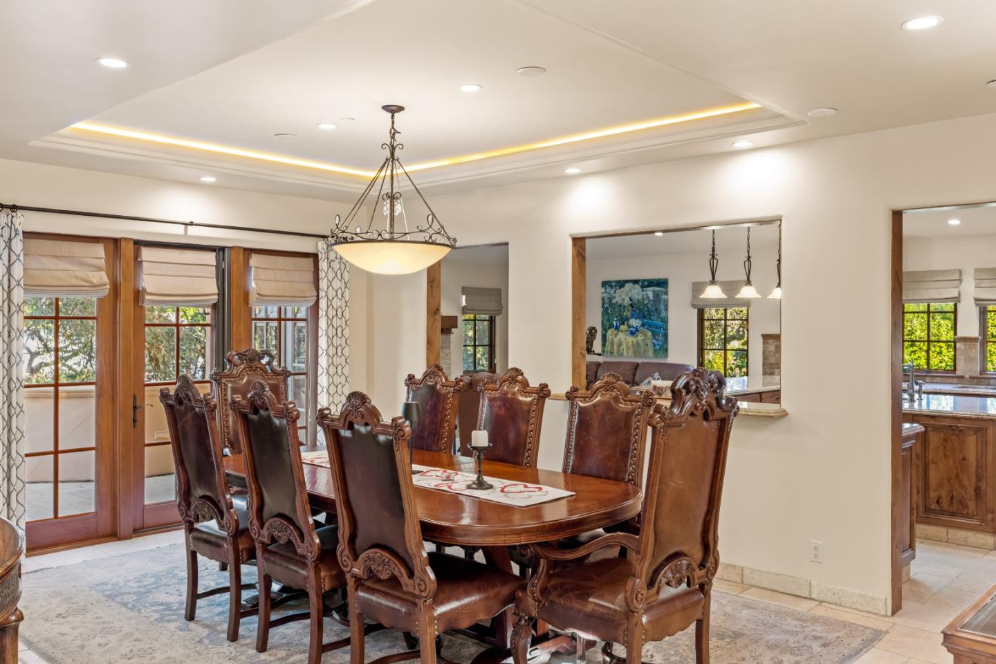 3116 Bird Rock Road Pebble Beach, CA 93953 - Photo 6 of 37 a dining room with furniture window and wooden floor