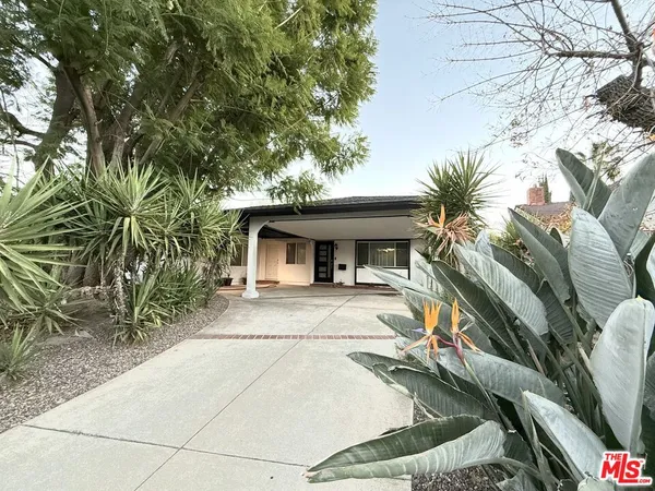 a view of a house with a patio
