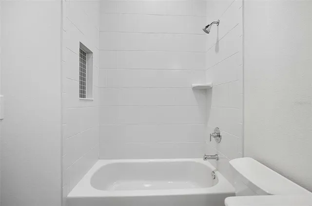 a view of a backyard with sitting area