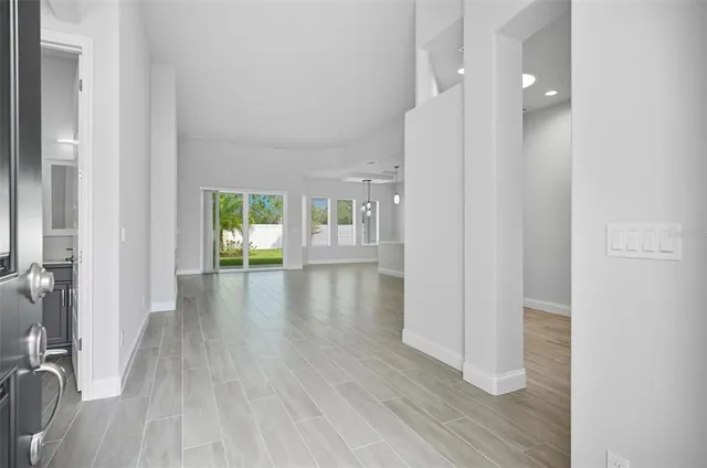a stove top oven sitting inside of a kitchen