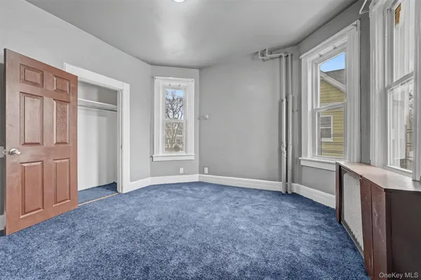 a kitchen with a stove a sink and a refrigerator