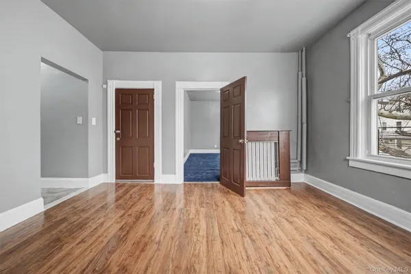 a view of a livingroom with wooden floor