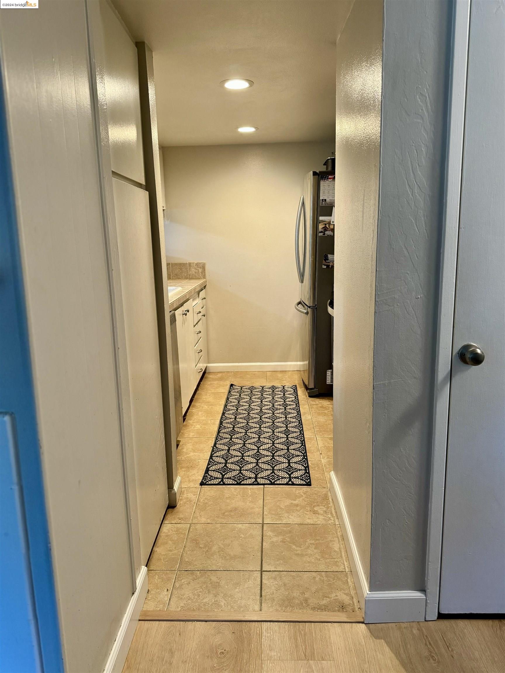 5519 Roundtree Drive, Unit A Concord, CA 94521 - Photo 9 of 9 a bathroom with a glass door shower and a mirror