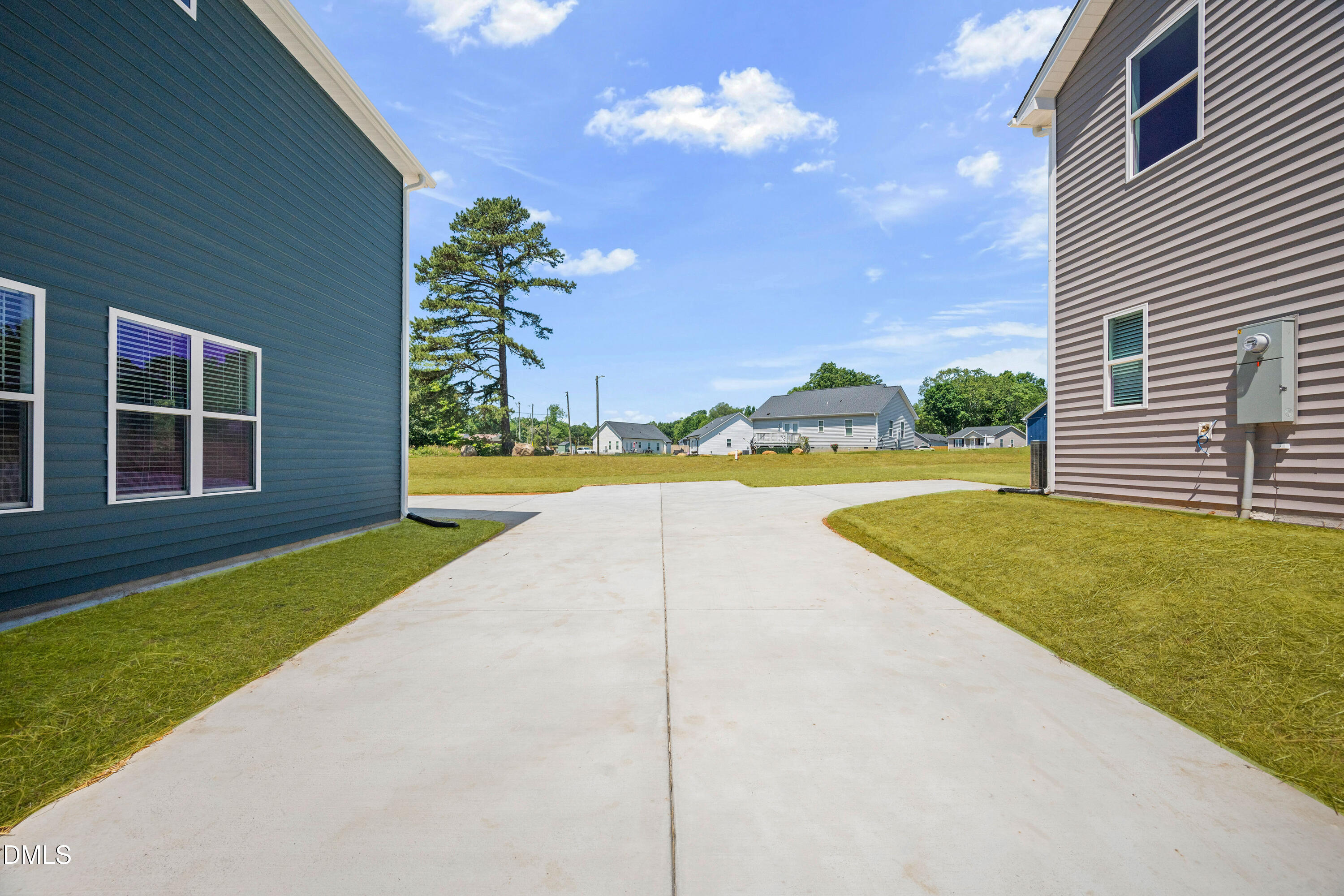 1256 Hurdle Mills Road Roxboro, NC 27573 - Photo 39 of 48 a view of a house with swimming pool and a yard