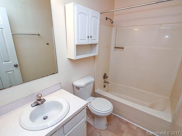 165 McAlway Road Charlotte, NC 28211 - Photo 16 of 23 a bathroom with a toilet sink and shower
