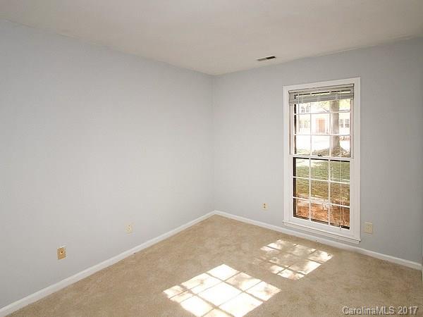 165 McAlway Road Charlotte, NC 28211 - Photo 18 of 23 an empty room with windows