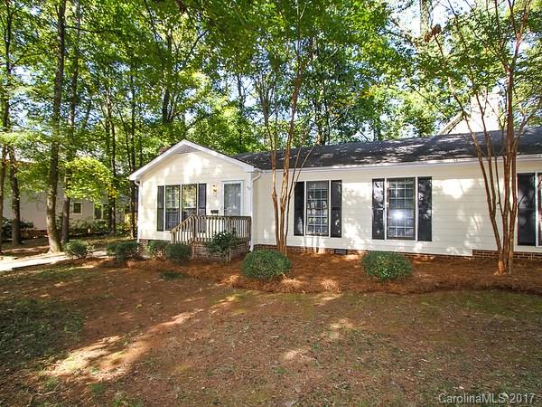 165 McAlway Road Charlotte, NC 28211 - Photo 4 of 23 a front view of a house with a garden
