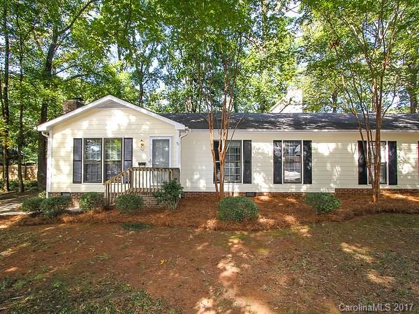165 McAlway Road Charlotte, NC 28211 - Photo 5 of 23 a front view of a house with a garden
