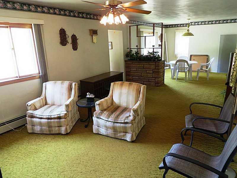 719 Story Road Slickville, PA 15684 - Photo 3 of 15 Living Room.