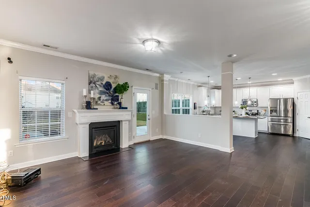 a view of kitchen with furniture and a fireplace