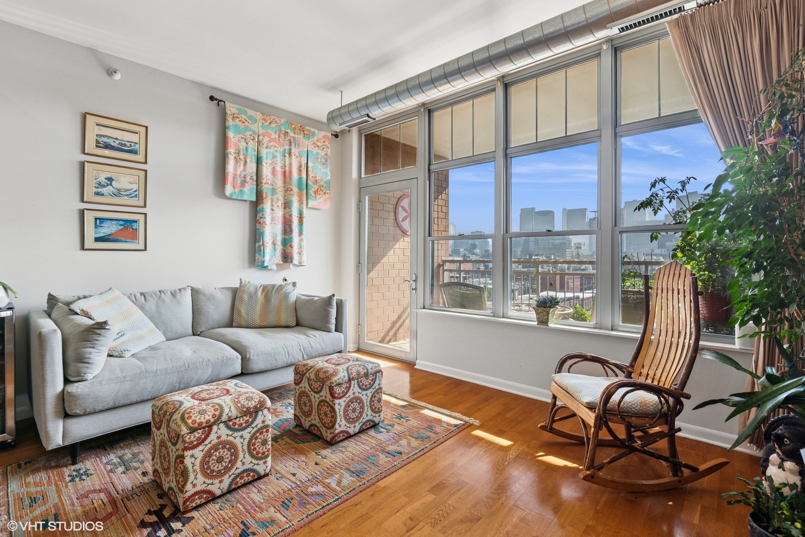 1200 West Monroe Street, Unit 805 Chicago, IL 60607 - Photo 5 of 21 a living room with furniture and a floor to ceiling window
