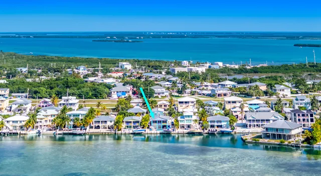 a view of a balcony with chairs