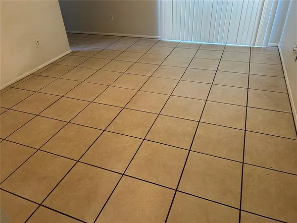 a view of an empty room and utility room