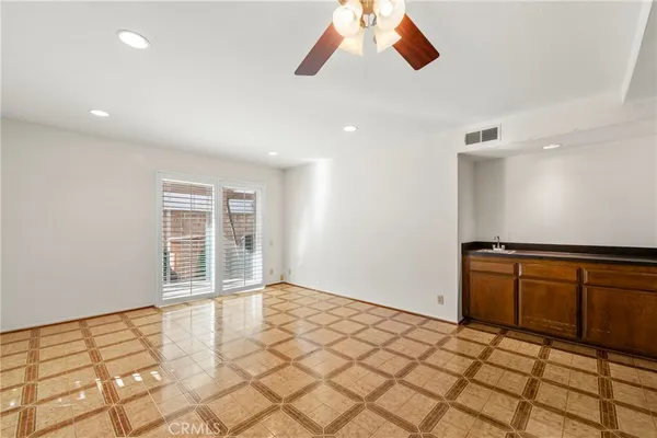 a view of a kitchen with a sink