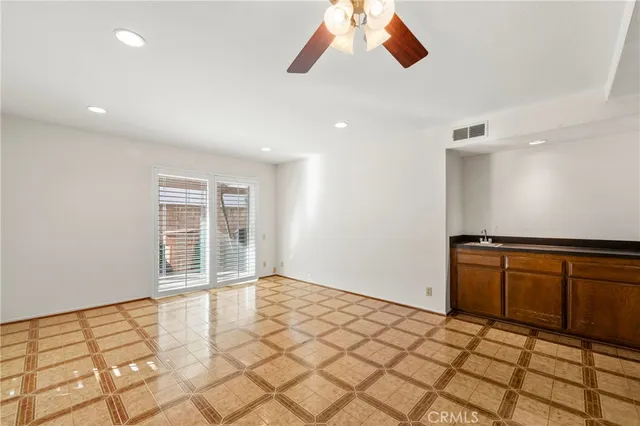 a view of a kitchen with a sink
