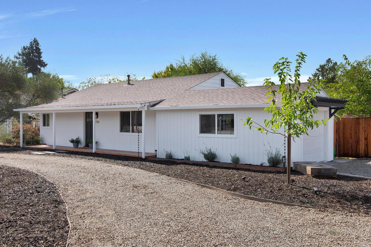 733 Benjamins Road Santa Rosa, CA 95409 - Photo 1 of 1 a front view of a house with plants