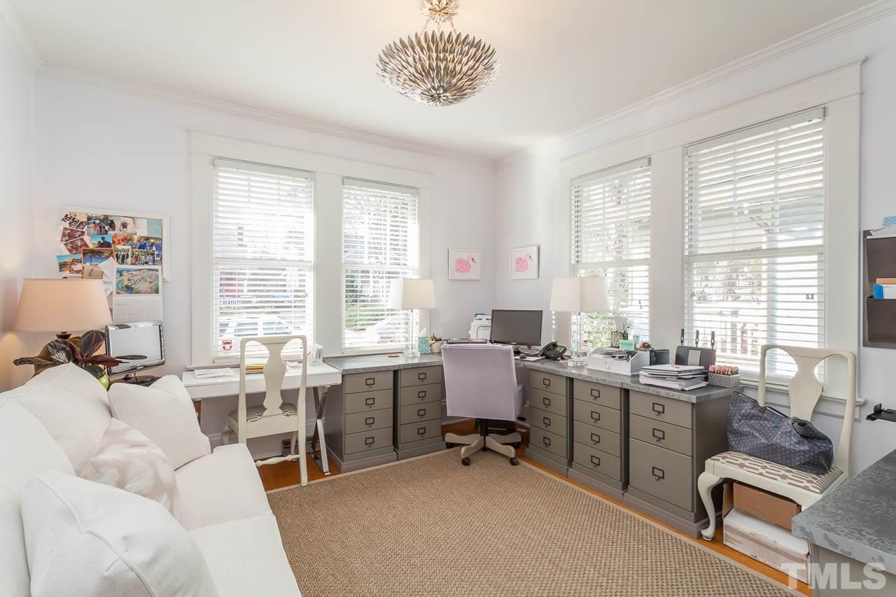 1702 Dare Street Raleigh, NC 27608 - Photo 16 of 25 a view of a livingroom with workspace and a window