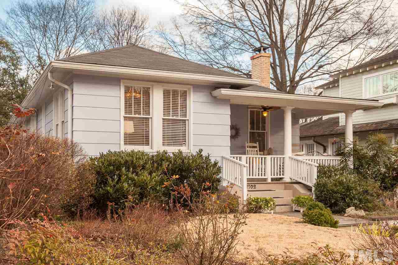 1702 Dare Street Raleigh, NC 27608 - Photo 3 of 25 front view of a house with a yard