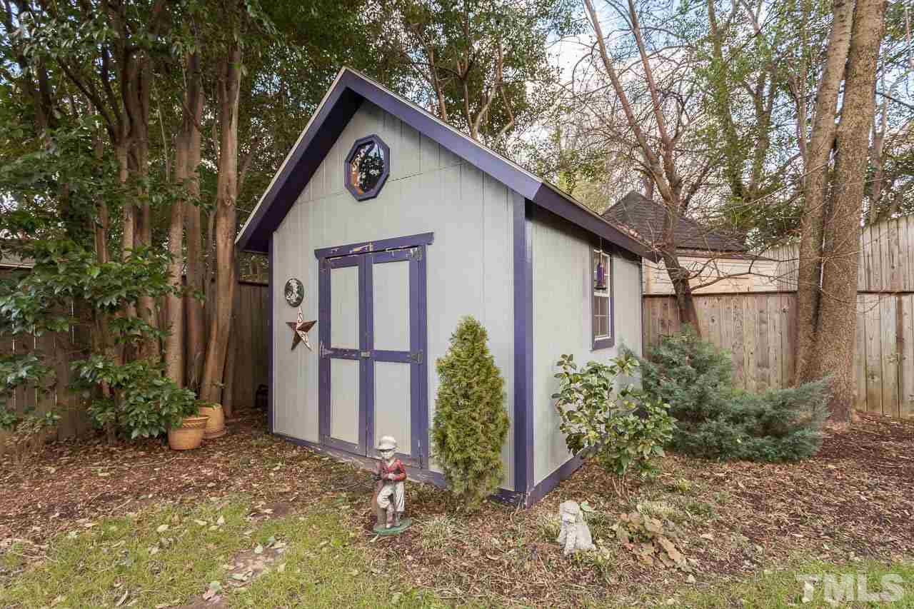1702 Dare Street Raleigh, NC 27608 - Photo 24 of 25 a front view of a house with garden