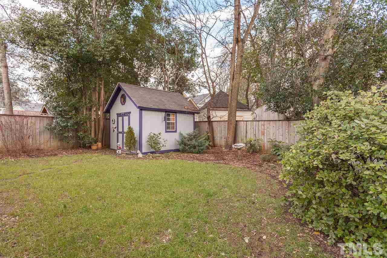 1702 Dare Street Raleigh, NC 27608 - Photo 25 of 25 a front view of a house with yard and green space