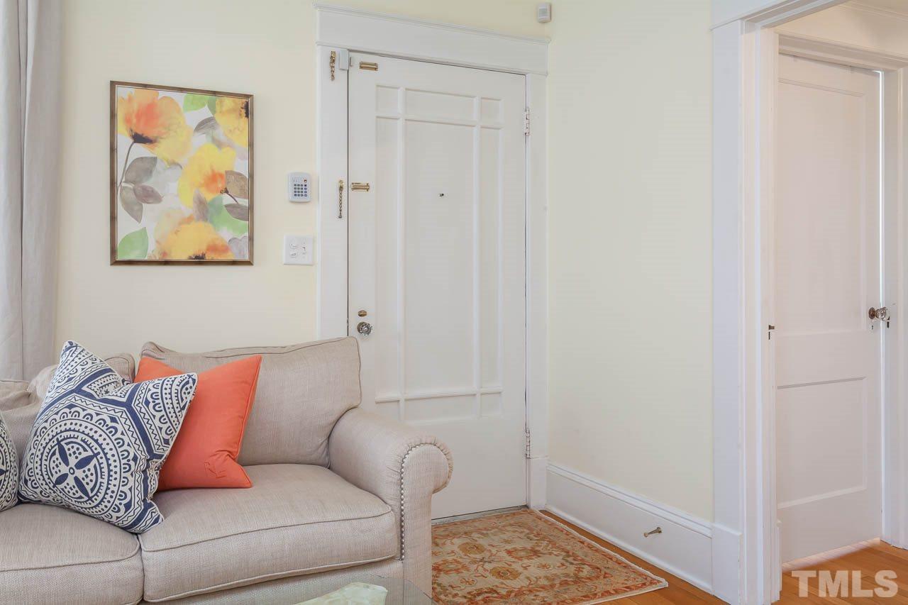 1702 Dare Street Raleigh, NC 27608 - Photo 7 of 25 a living room with furniture and a window