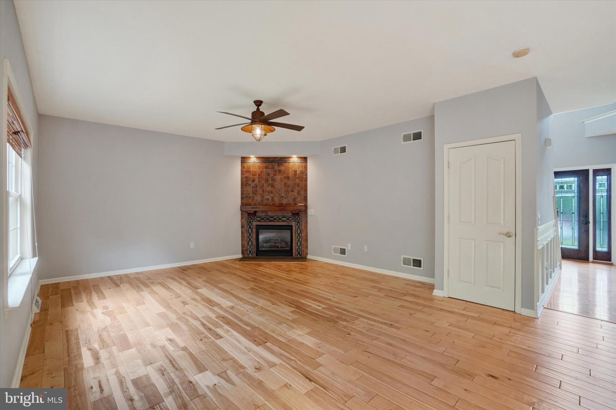 857 Willow Ridge Court York, PA 17404 - Photo 14 of 27 a view of an empty room with a window and wooden floor