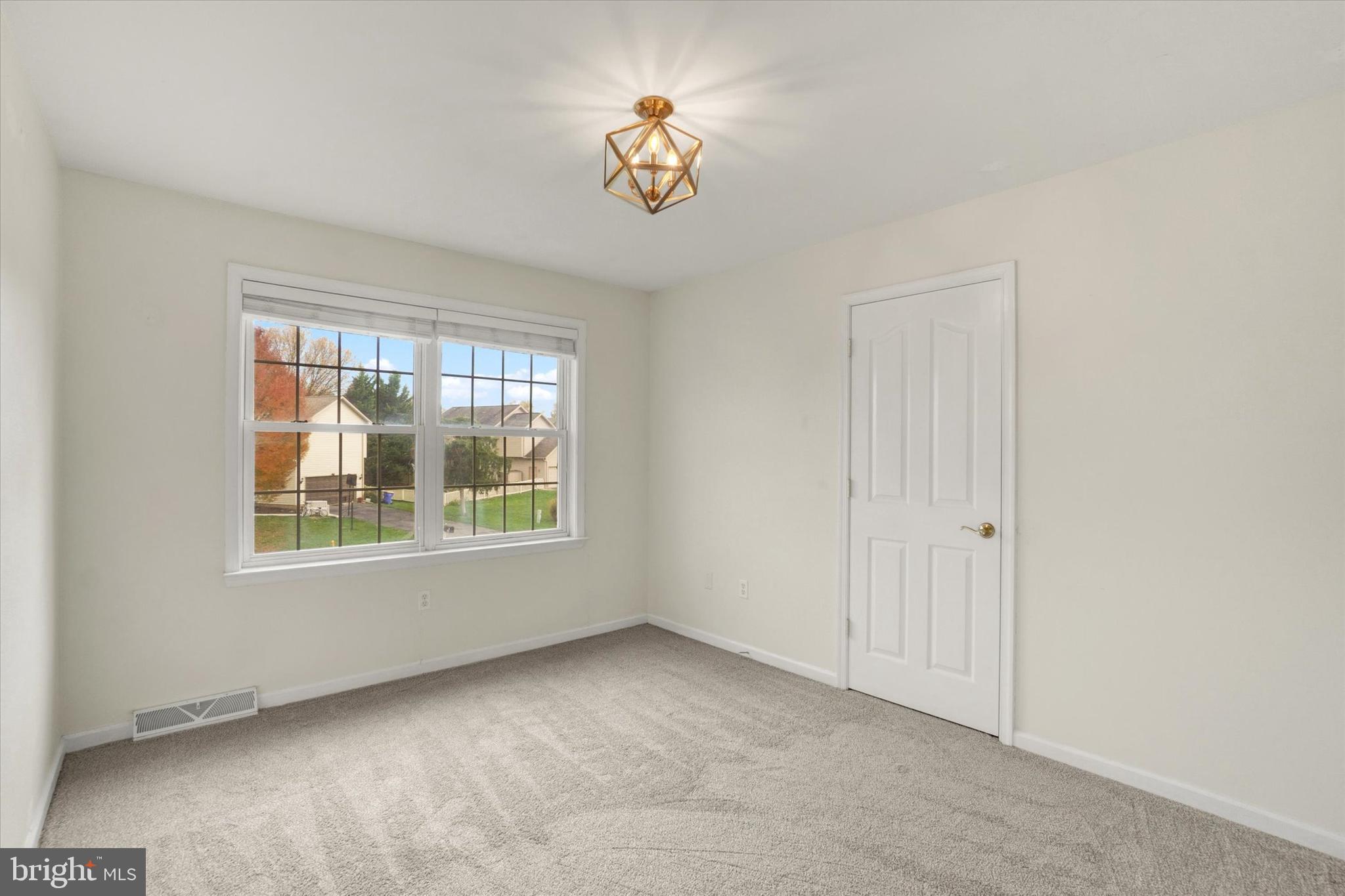 857 Willow Ridge Court York, PA 17404 - Photo 24 of 27 a view of an empty room with a window