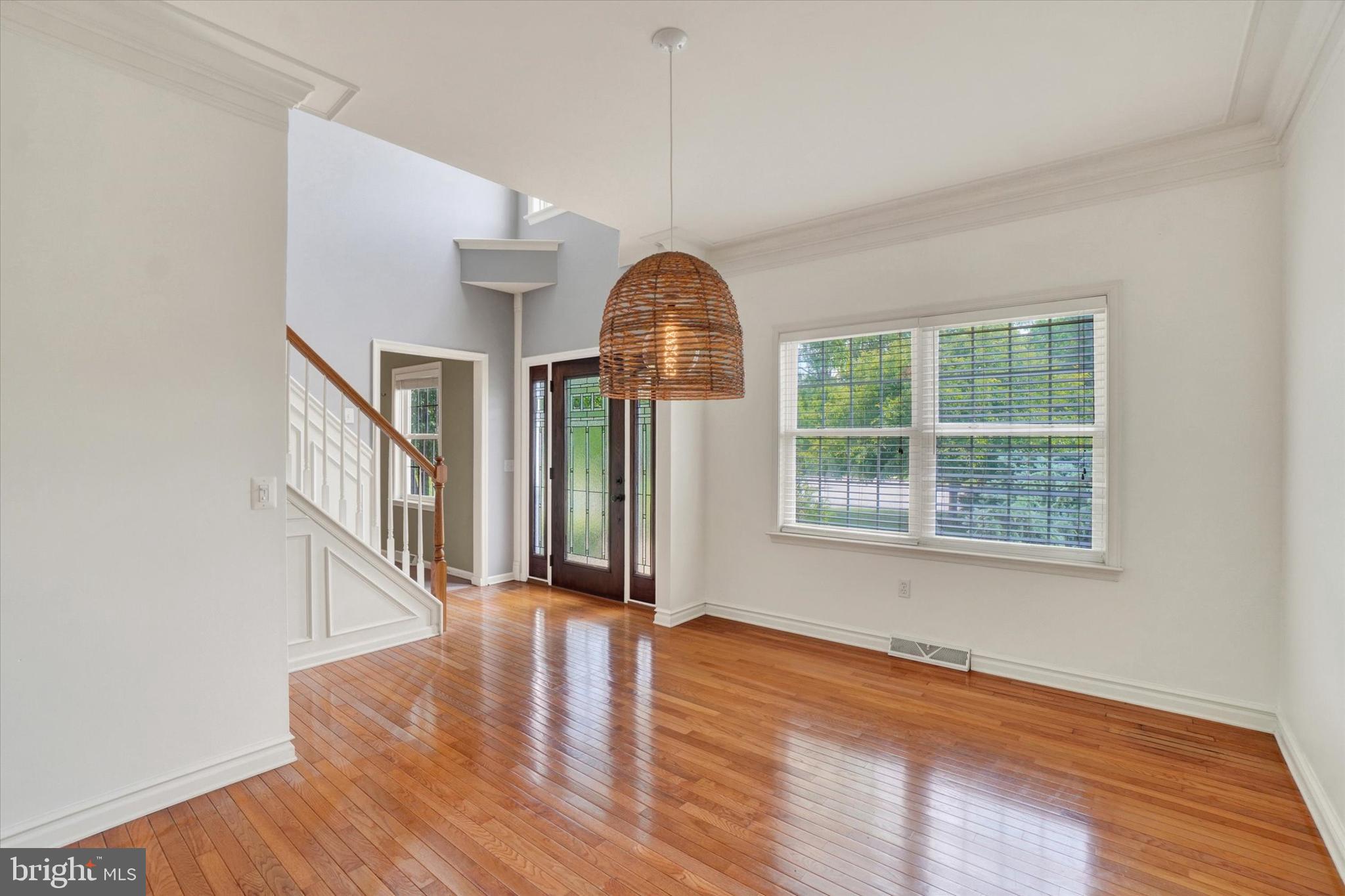 857 Willow Ridge Court York, PA 17404 - Photo 7 of 27 a view of empty room with wooden floor and fan