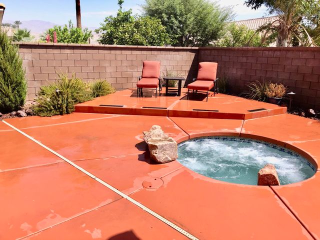 a terrace with outdoor seating and plants