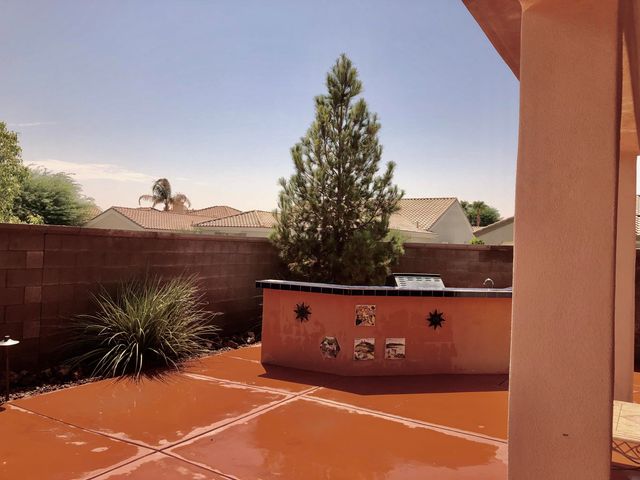 a view of balcony with furniture