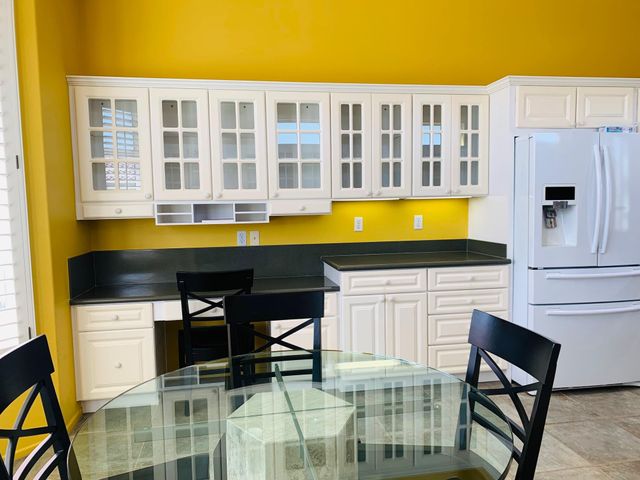 a view of a swimming pool with a lounge chair