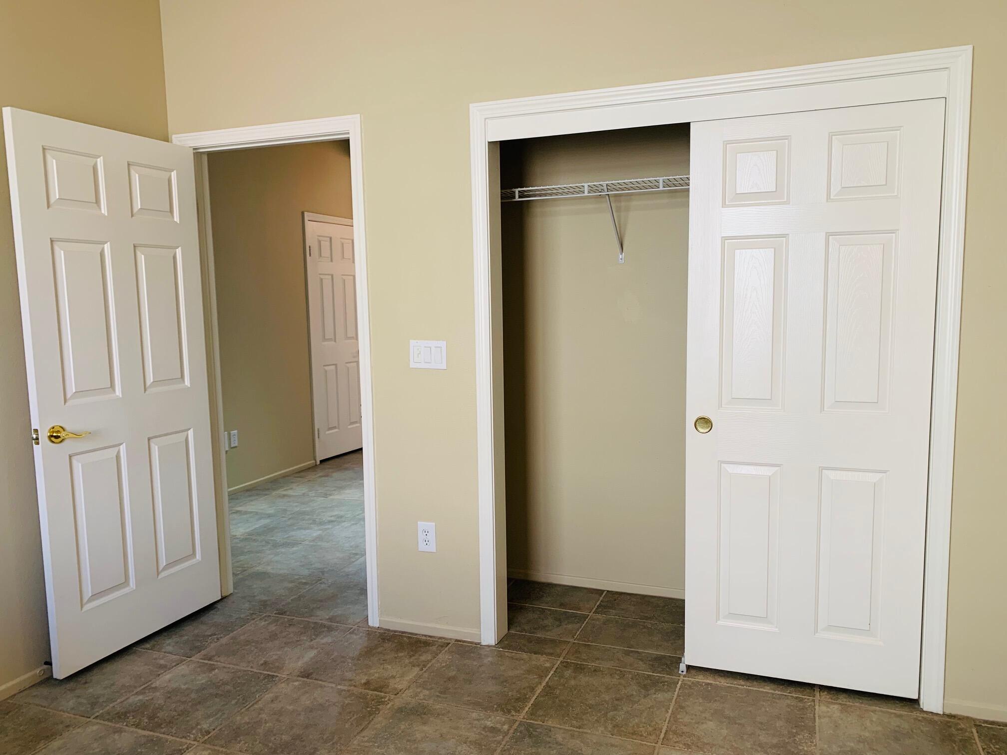 35932 Beringer Road Palm Desert, CA 92211 - Photo 28 of 44 an empty room with windows closet and livingroom view