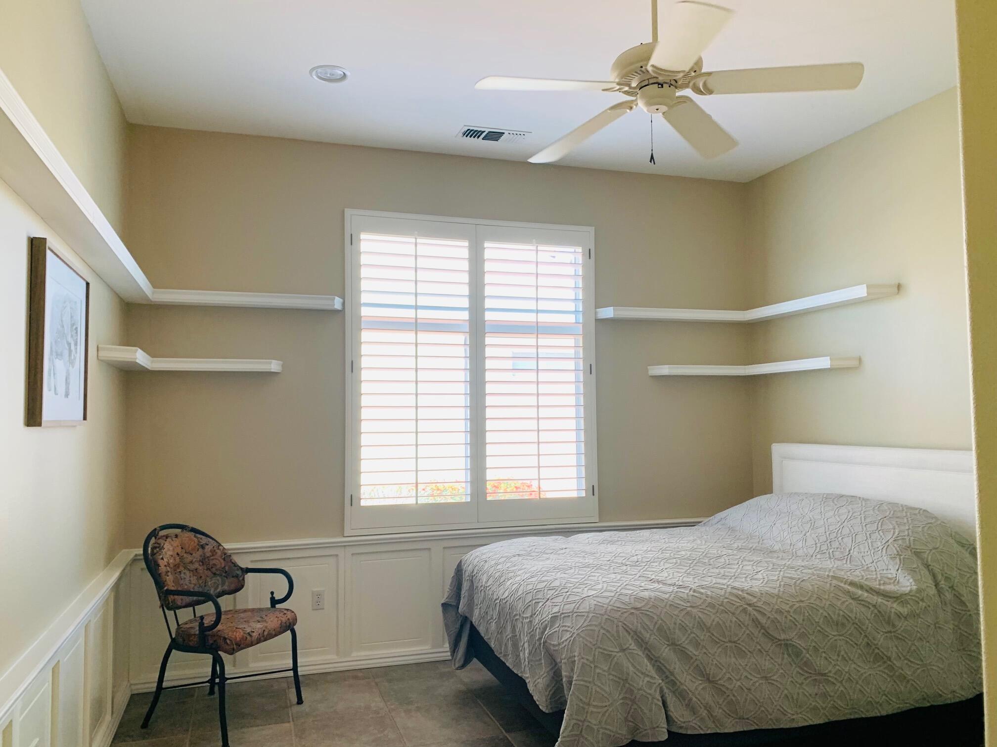 35932 Beringer Road Palm Desert, CA 92211 - Photo 29 of 44 a bedroom with a bed and chair