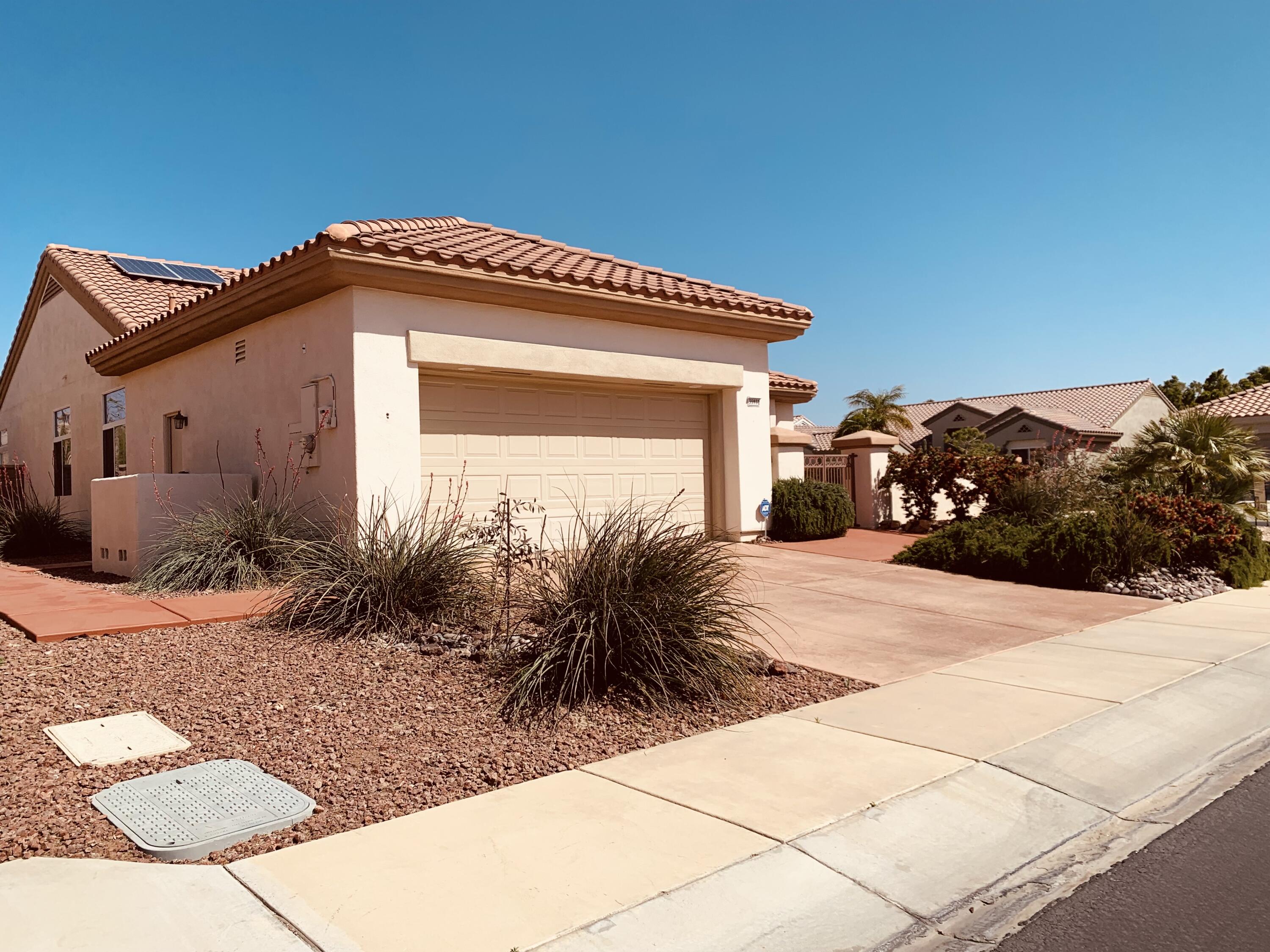 35932 Beringer Road Palm Desert, CA 92211 - Photo 4 of 44 a view of a house with a yard
