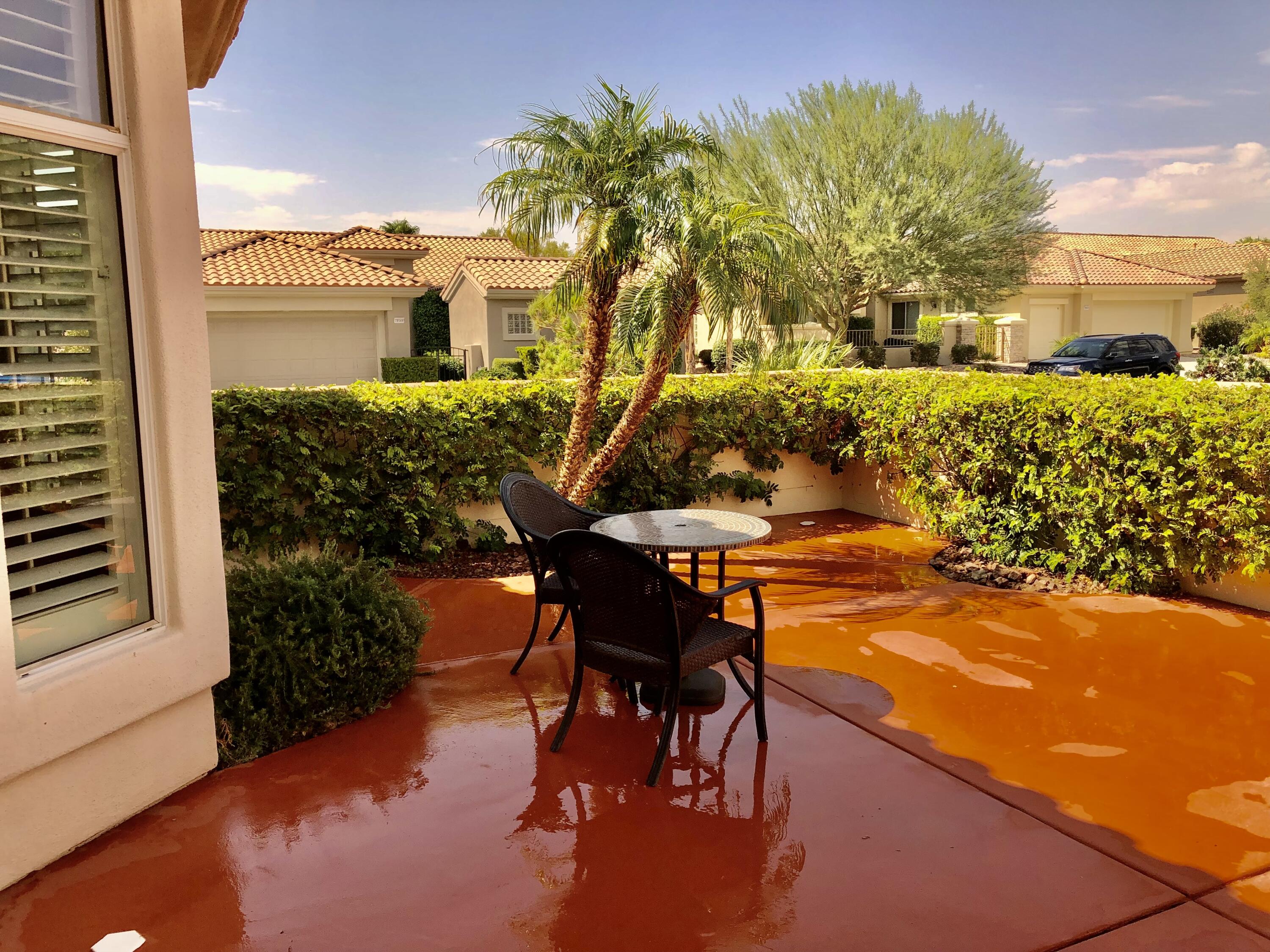 35932 Beringer Road Palm Desert, CA 92211 - Photo 5 of 44 a view of a terrace with chairs