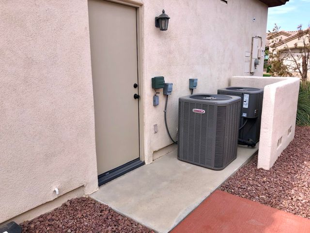 a view of a storage & utility room with a sink