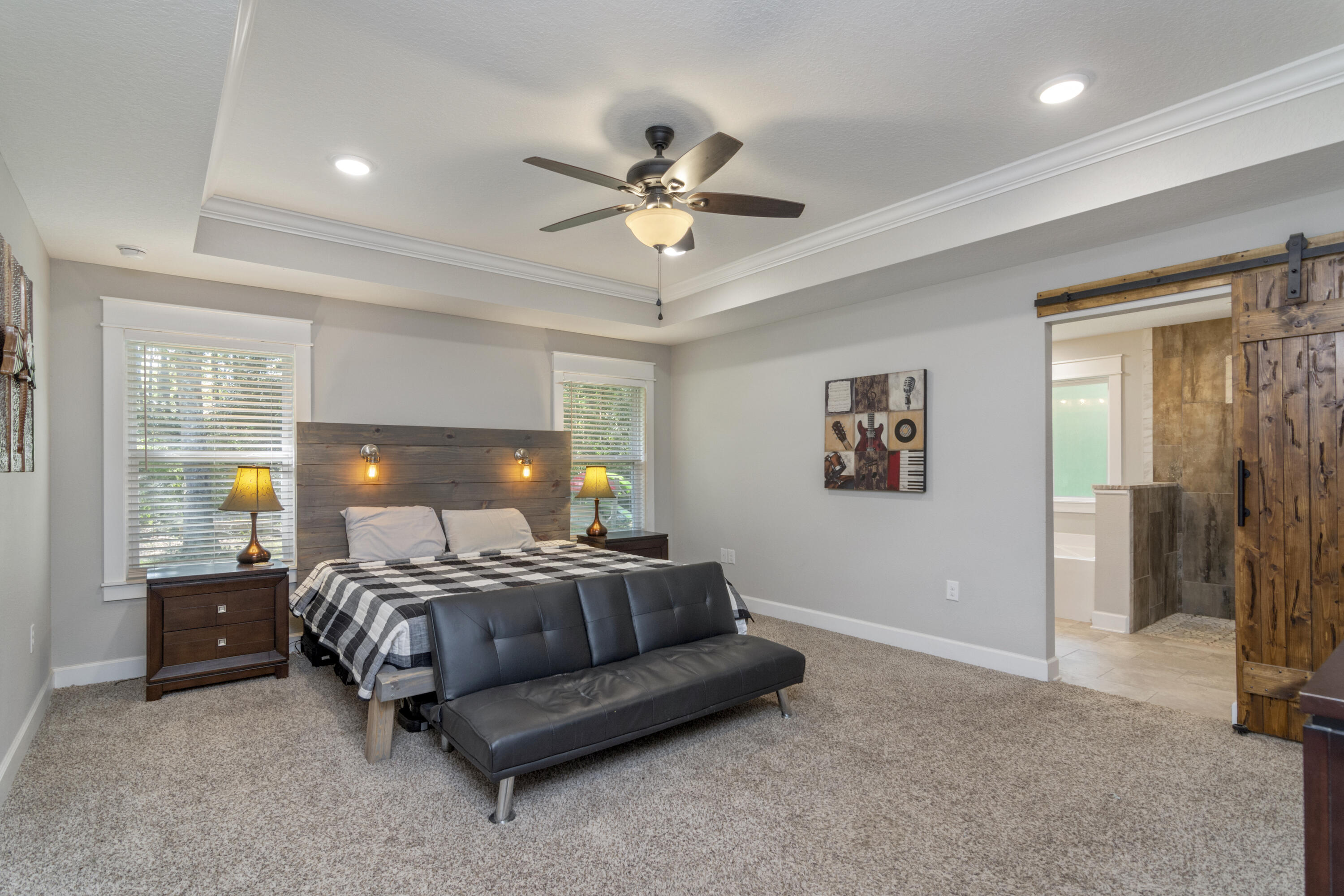 5822 Dairy Road Baker, FL 32531 - Photo 29 of 47 a bedroom with a bed and ceiling fan