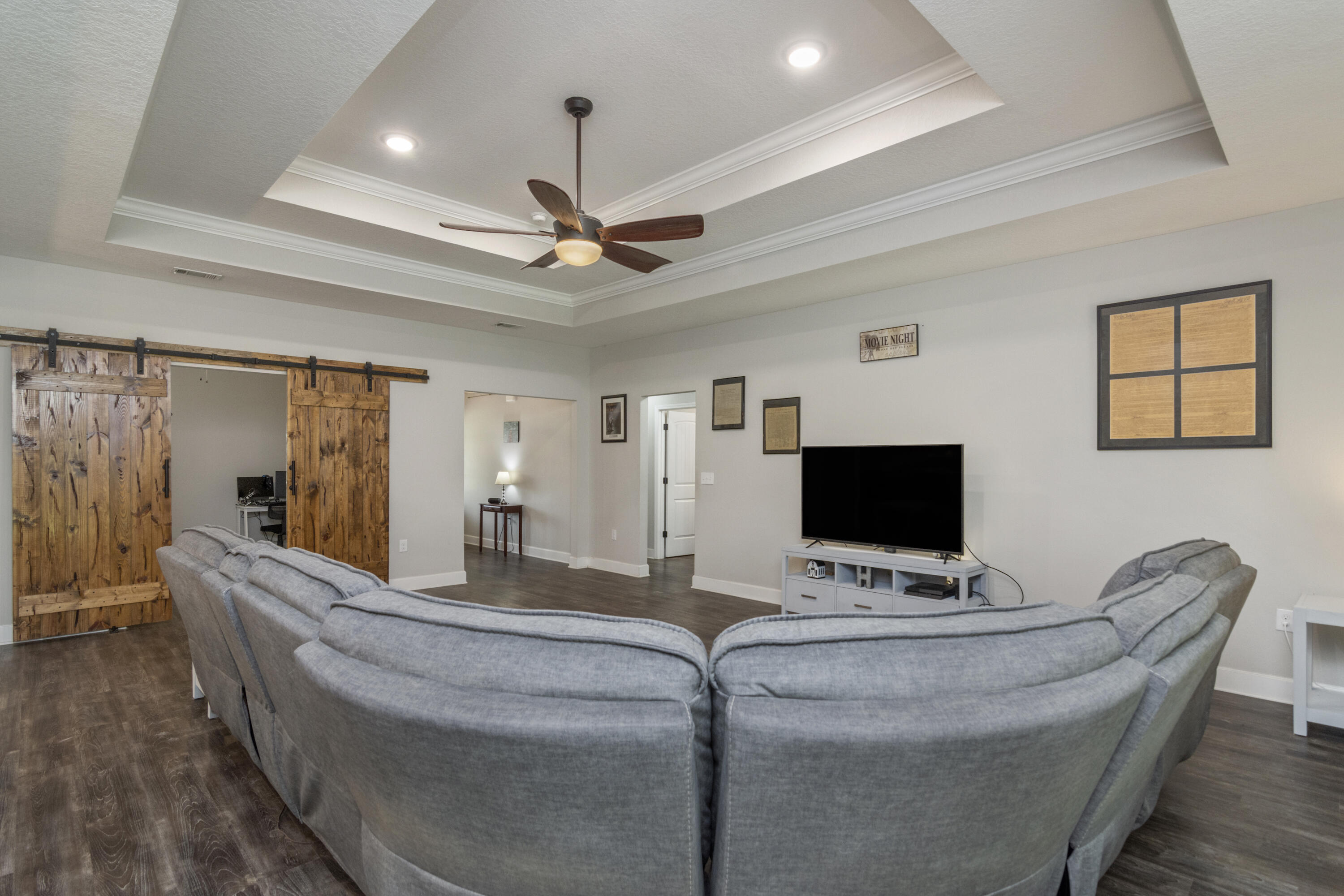 5822 Dairy Road Baker, FL 32531 - Photo 10 of 47 a living room with furniture and a flat screen tv