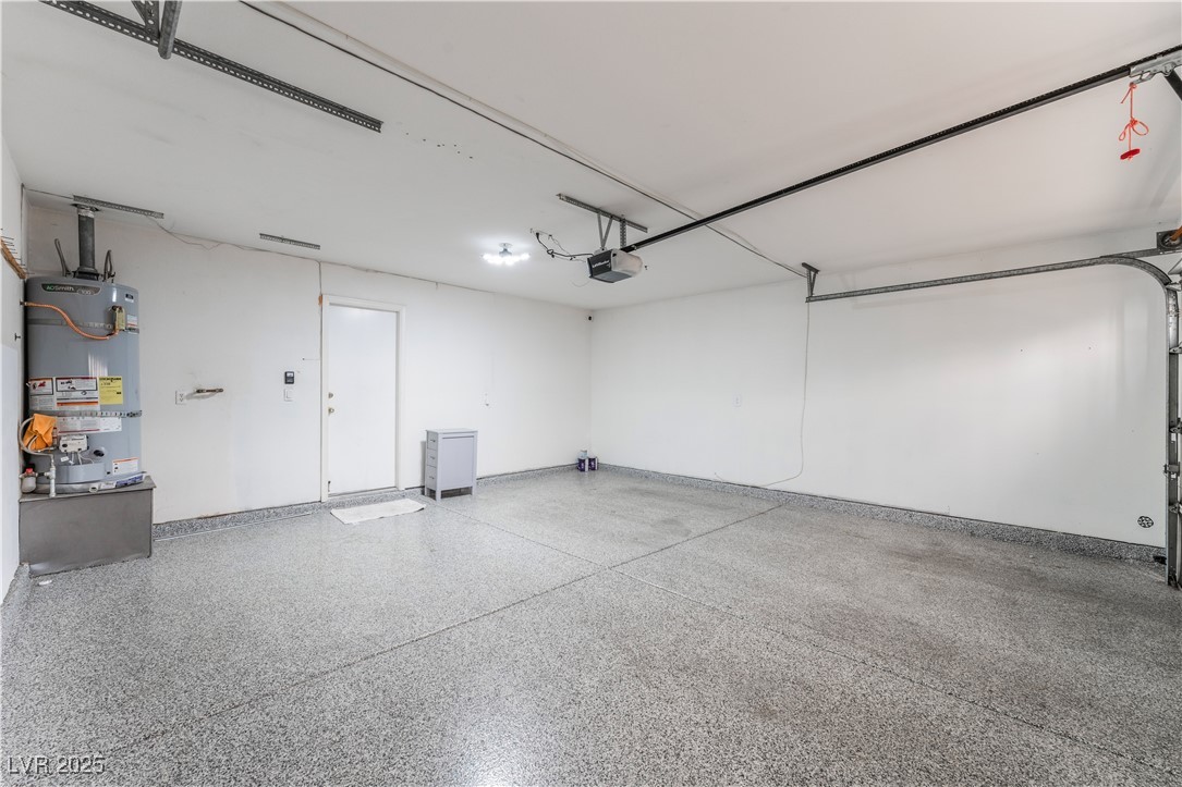 3695 Funston Way Las Vegas, NV 89129 - Photo 40 of 43 Garage featuring strapped water heater