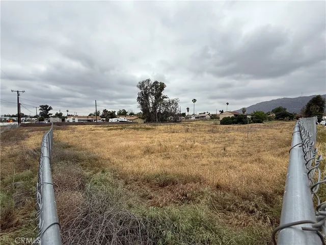 a view of a large body of water with a building in the background