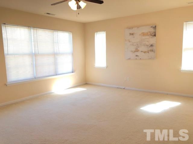 9810 Raleigh, NC 27617 - Photo 20 of 26 an empty room with a window