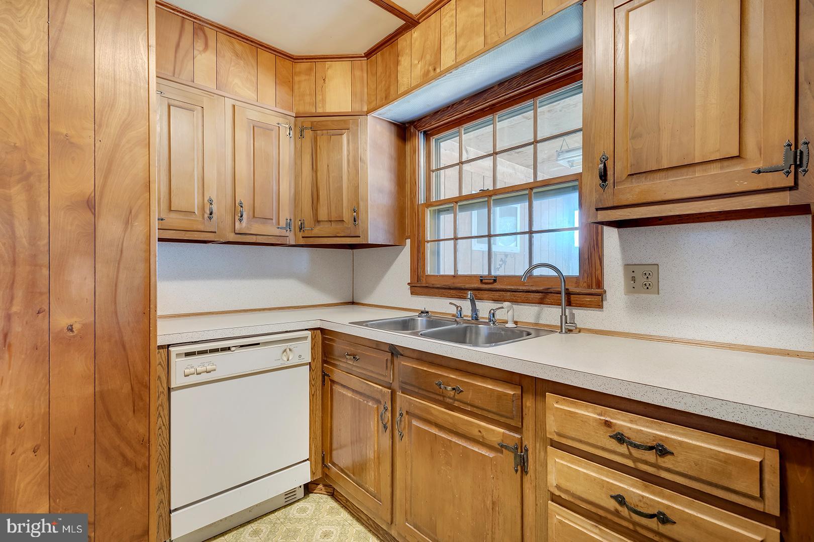 57 Plain Dealing Road Magnolia, DE 19962 - Photo 14 of 64 a kitchen with granite countertop cabinets stainless steel appliances and a window