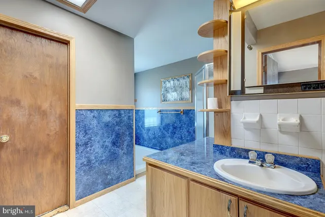 a view of a storage & utility room with washer and dryer