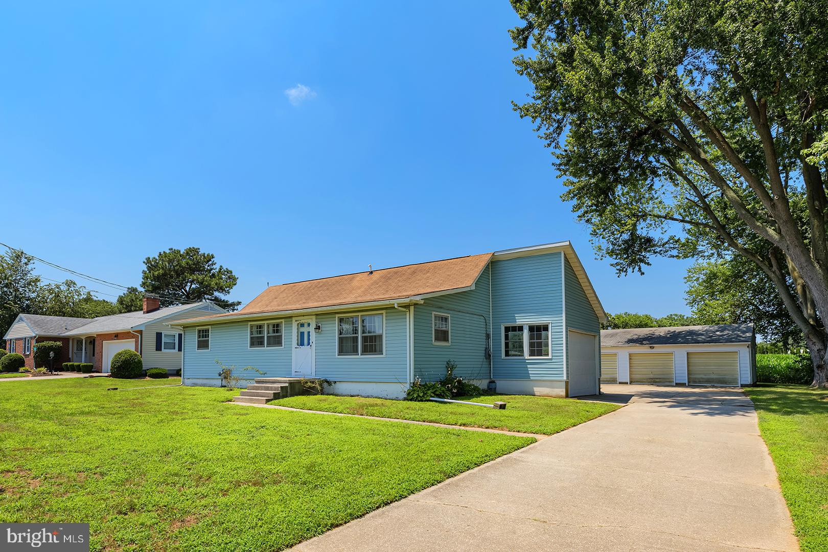 57 Plain Dealing Road Magnolia, DE 19962 - Photo 4 of 64 a front view of a house with a garden