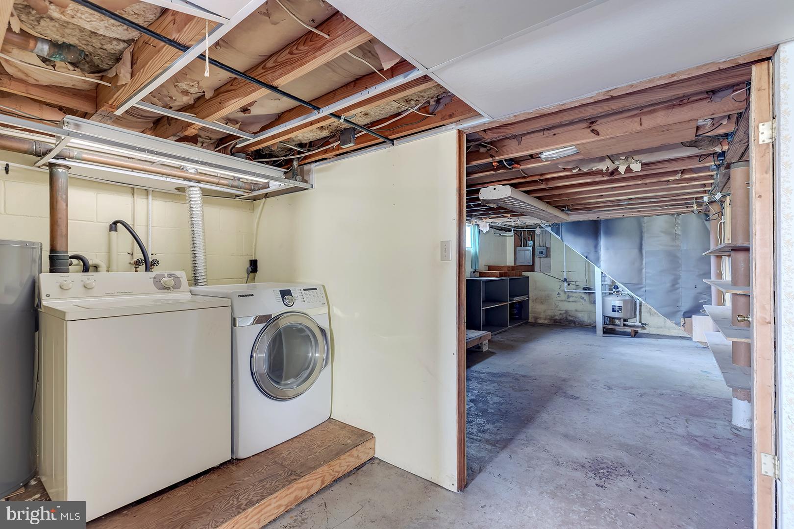 57 Plain Dealing Road Magnolia, DE 19962 - Photo 42 of 64 a view of a storage & utility room with washer and dryer