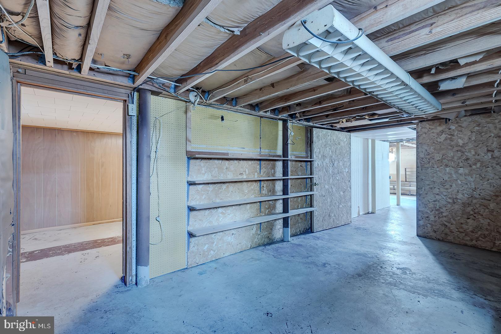 57 Plain Dealing Road Magnolia, DE 19962 - Photo 43 of 64 a view of empty room with wooden cabinet