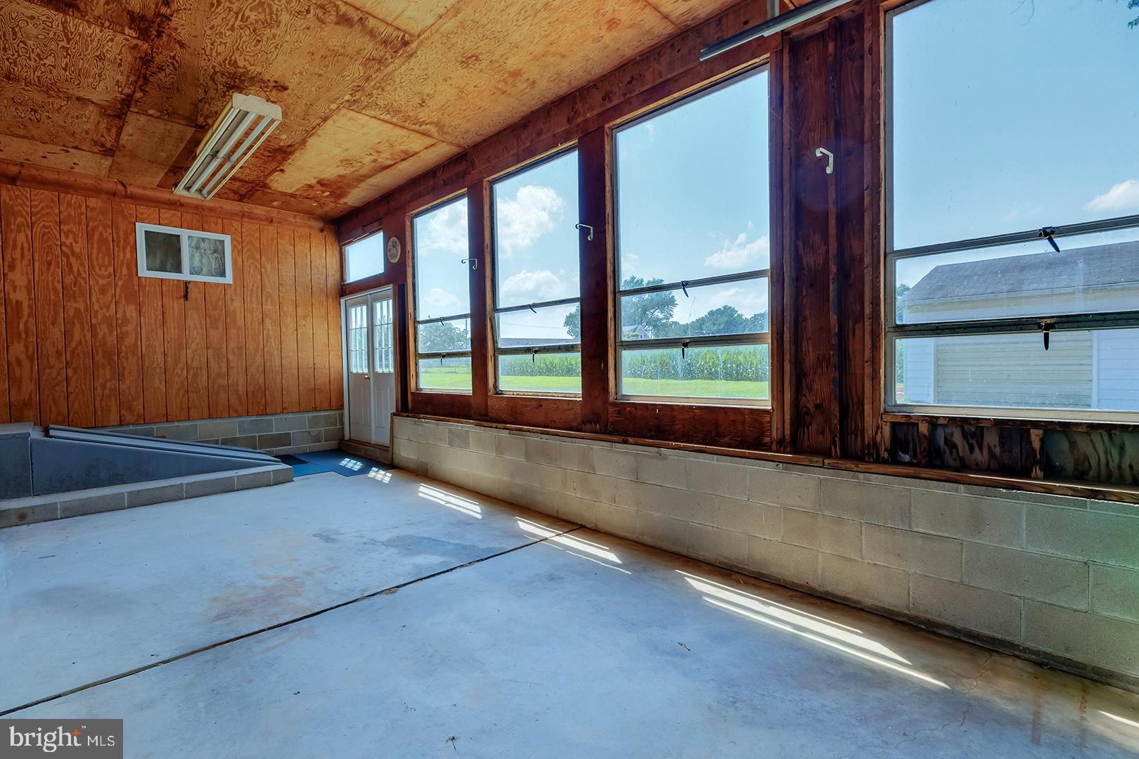 57 Plain Dealing Road Magnolia, DE 19962 - Photo 44 of 64 a view of an empty room with a window