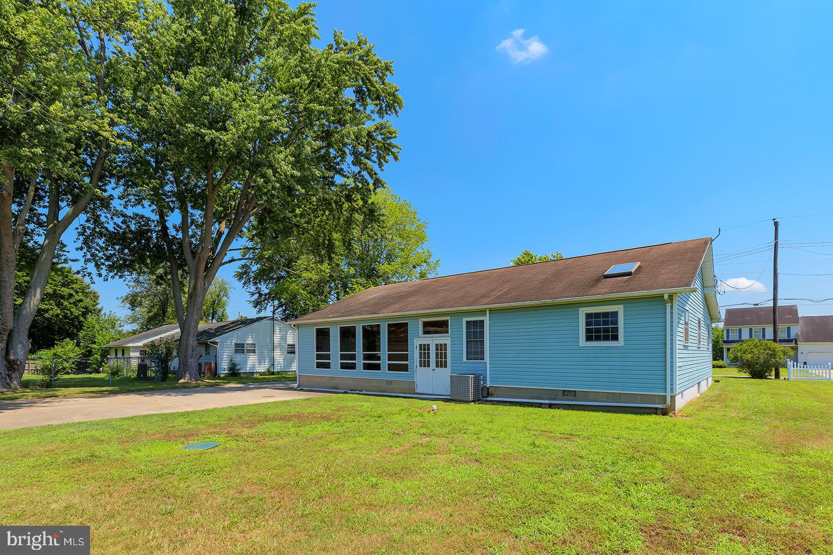 57 Plain Dealing Road Magnolia, DE 19962 - Photo 47 of 64 a front view of a house with a garden
