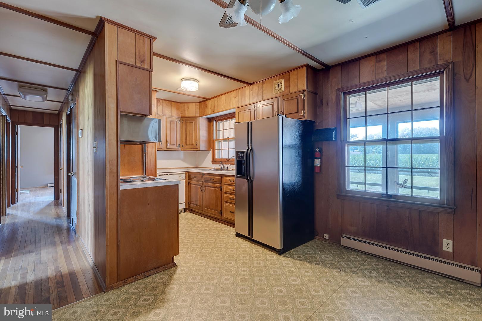 57 Plain Dealing Road Magnolia, DE 19962 - Photo 10 of 64 a kitchen with refrigerator and window